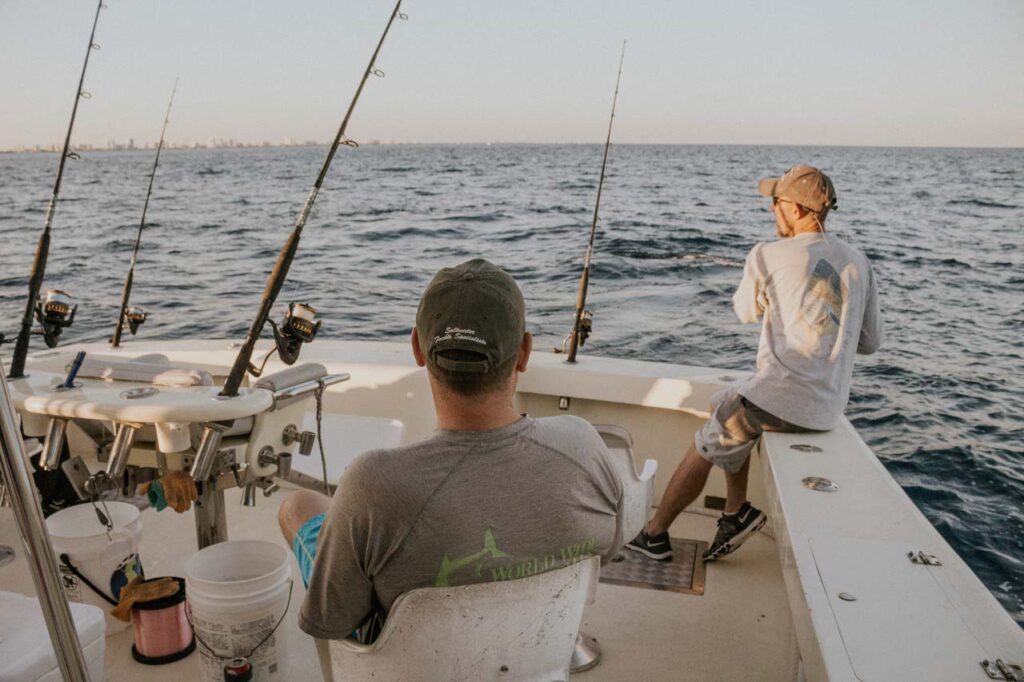 Men fishing on a boat in off the coast of Naples, Florida