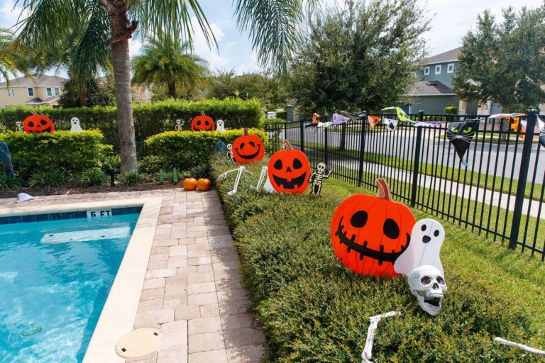 Outdoor pumpkin, ghost, and skeleton decorations for Encore's Stay-A-Spell