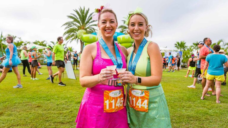 Racers toasting margaritas at the Margaritaville Run event