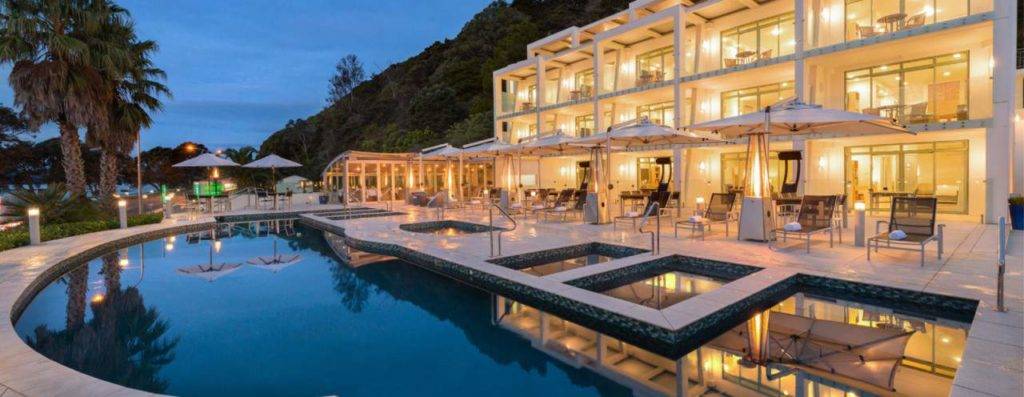 Paihia Beach Resort pool and suites during dusk