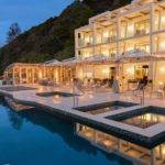 Paihia Beach Resort pool and suites during dusk