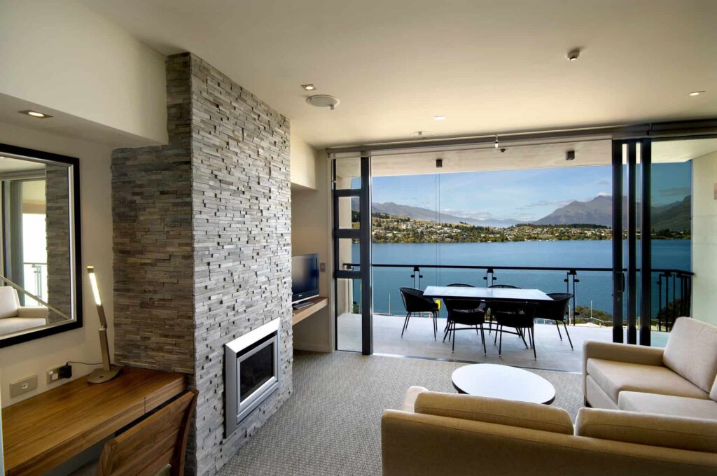 Executive Lake View 3 Bedroom Apartment living room with fireplace