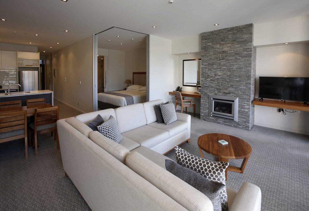 Executive Lake View 3 Bedroom Apartment living room with sectional sofa