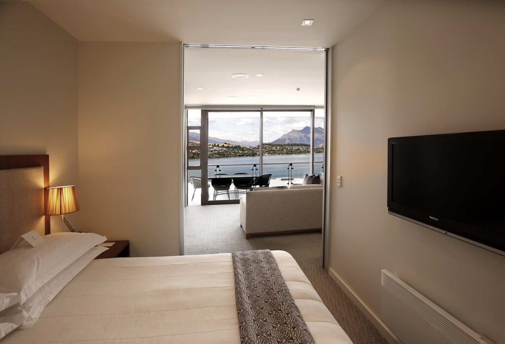 Executive Lake View One Bedroom Apartment bedroom with king bed