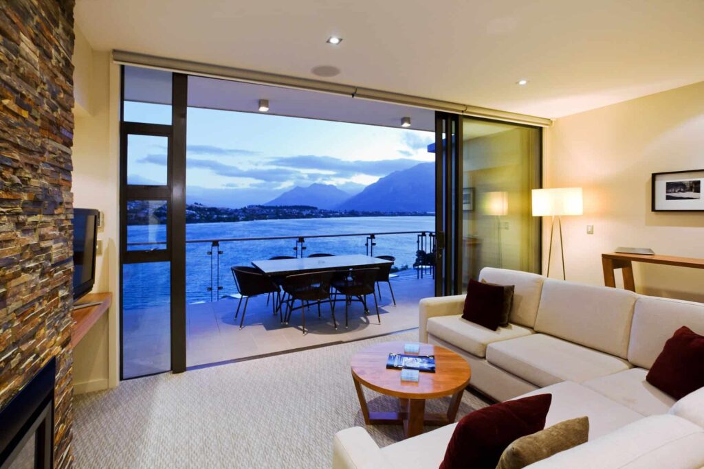 Executive Lake View One Bedroom Apartment living room with balcony