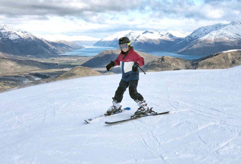 Kid learning how to ski