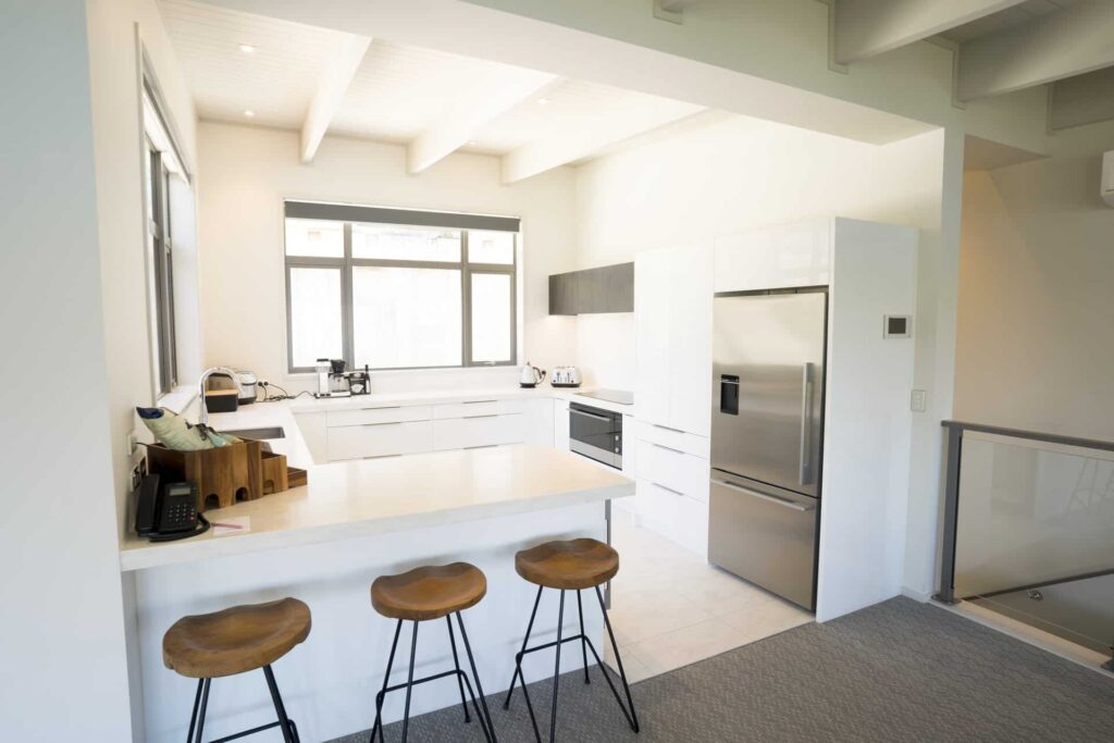 Kitchen with bar stool seating: Lake View 3 Bedroom Villa