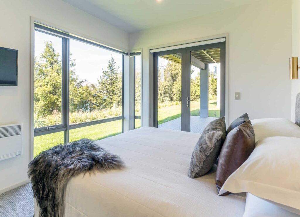 Rees Residence master bedroom suite with large king bed
