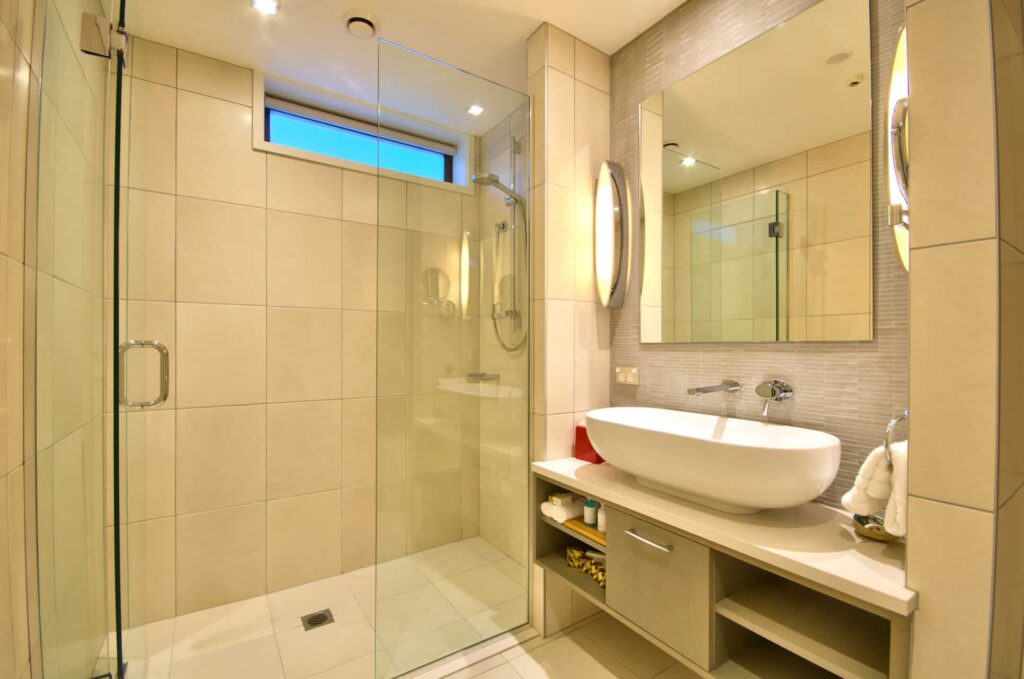 Superior 1 Bedroom Apartment bathroom with walk in shower and sink