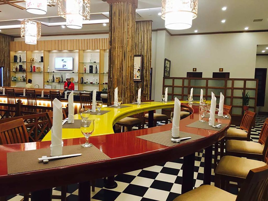 Bar seating with place settings at Takezono Restaurant of the Sokha Siem Reap Resort